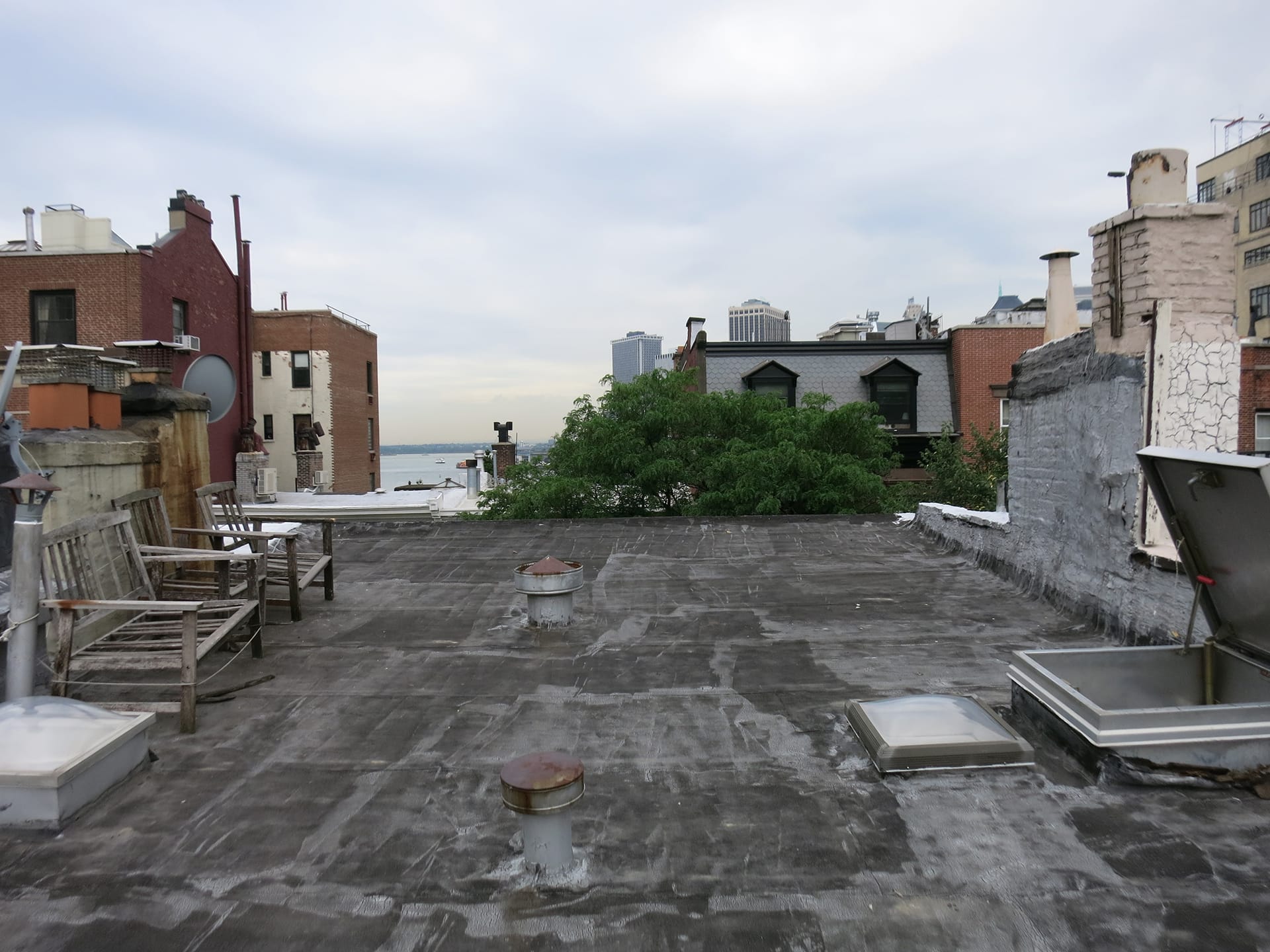 Unfinished rooftop of a Brooklyn Heights townhome before our renovation