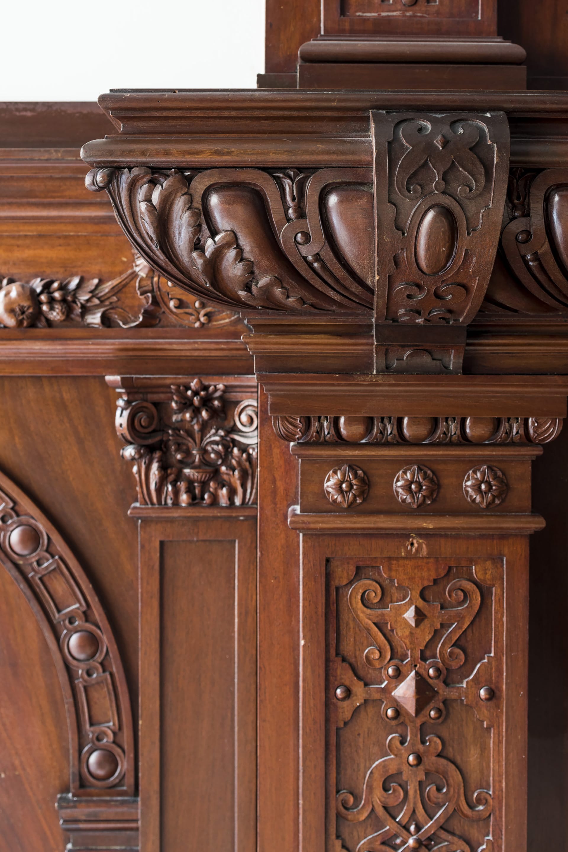 Detail of dark woodwork in the living room of an Upper West Side townhouse