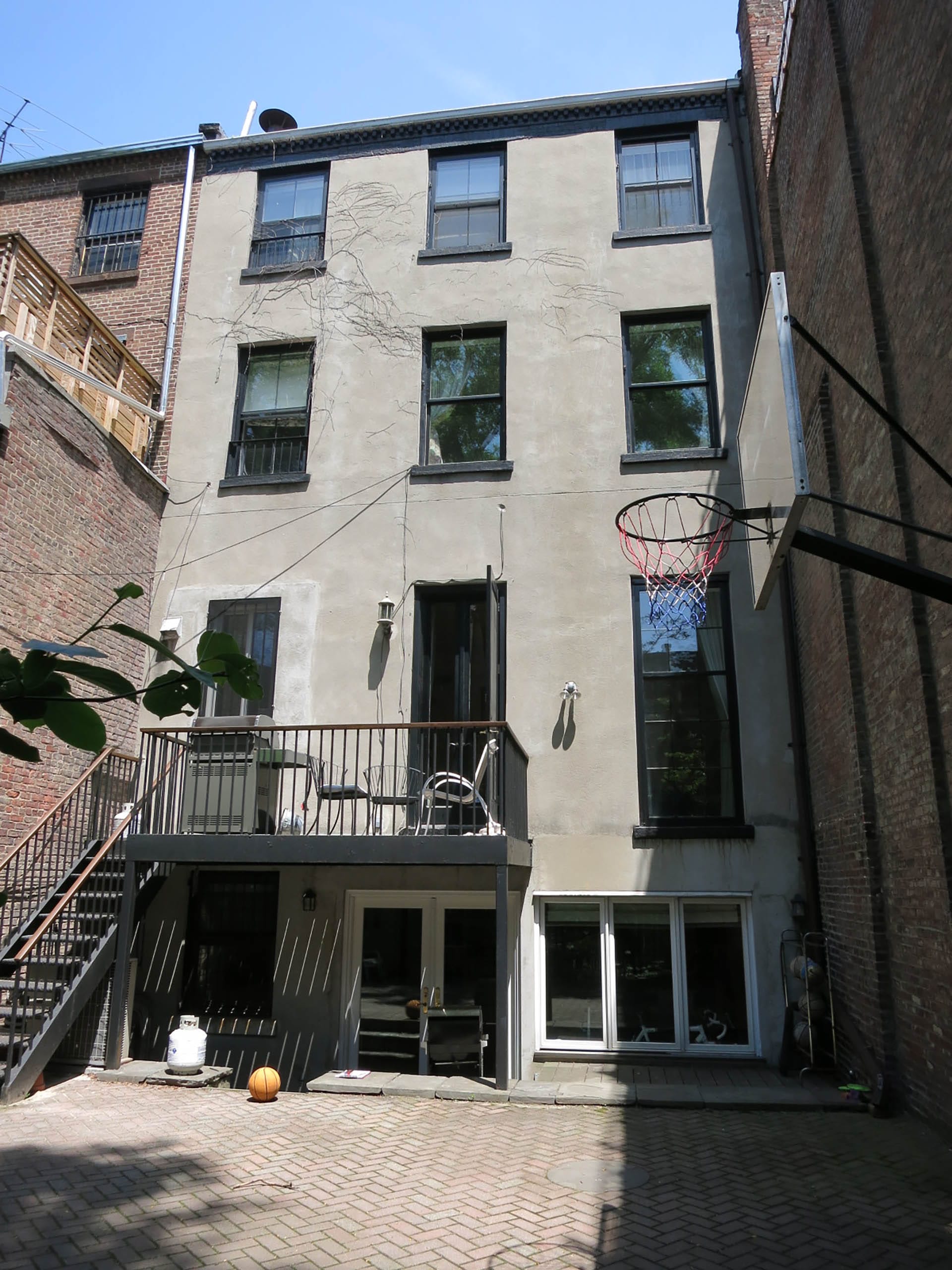 Rear façade and yard of a Brooklyn Heights townhouse before our renovation