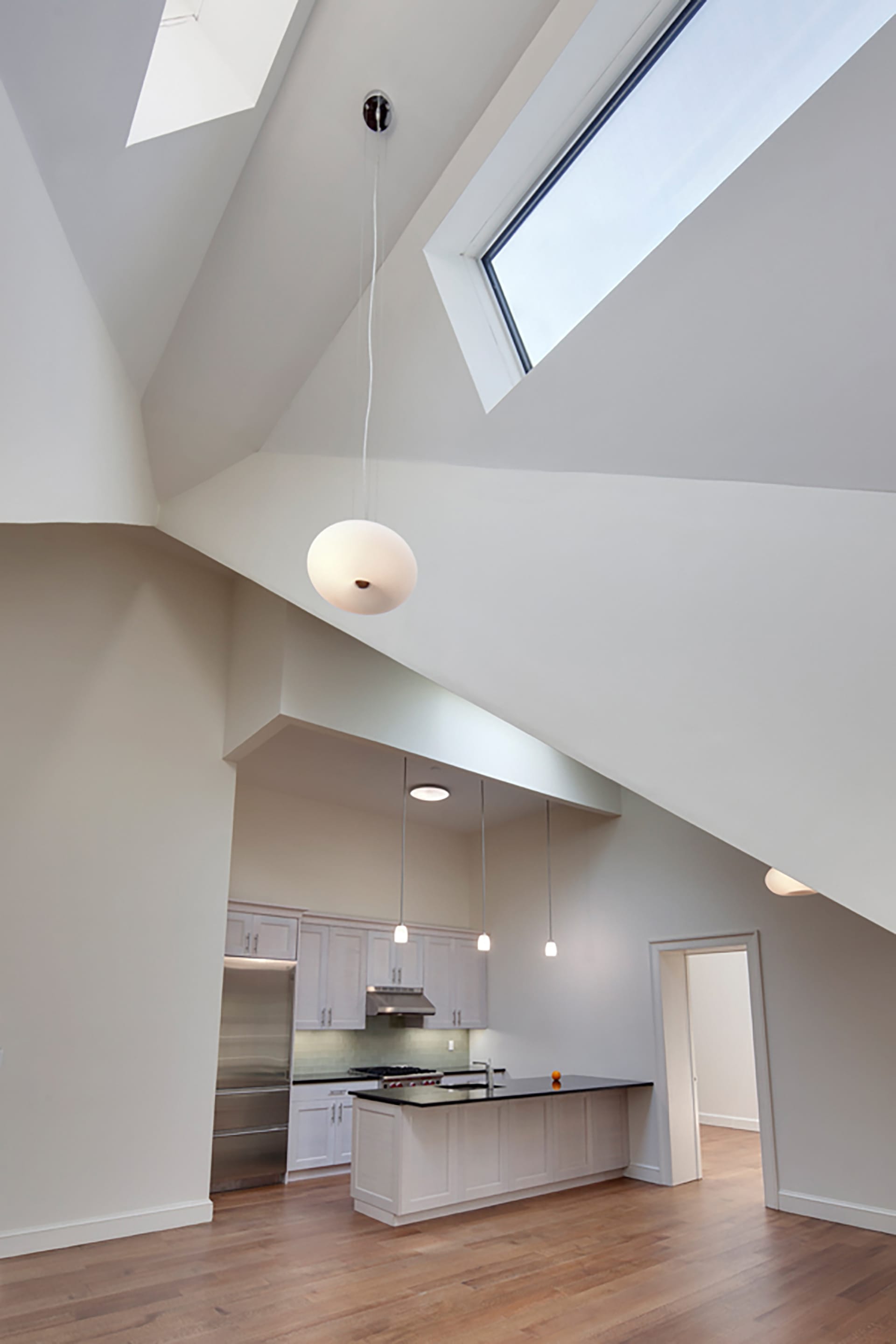 Kitchen with two skylights and very high ceilings in a Brooklyn condo