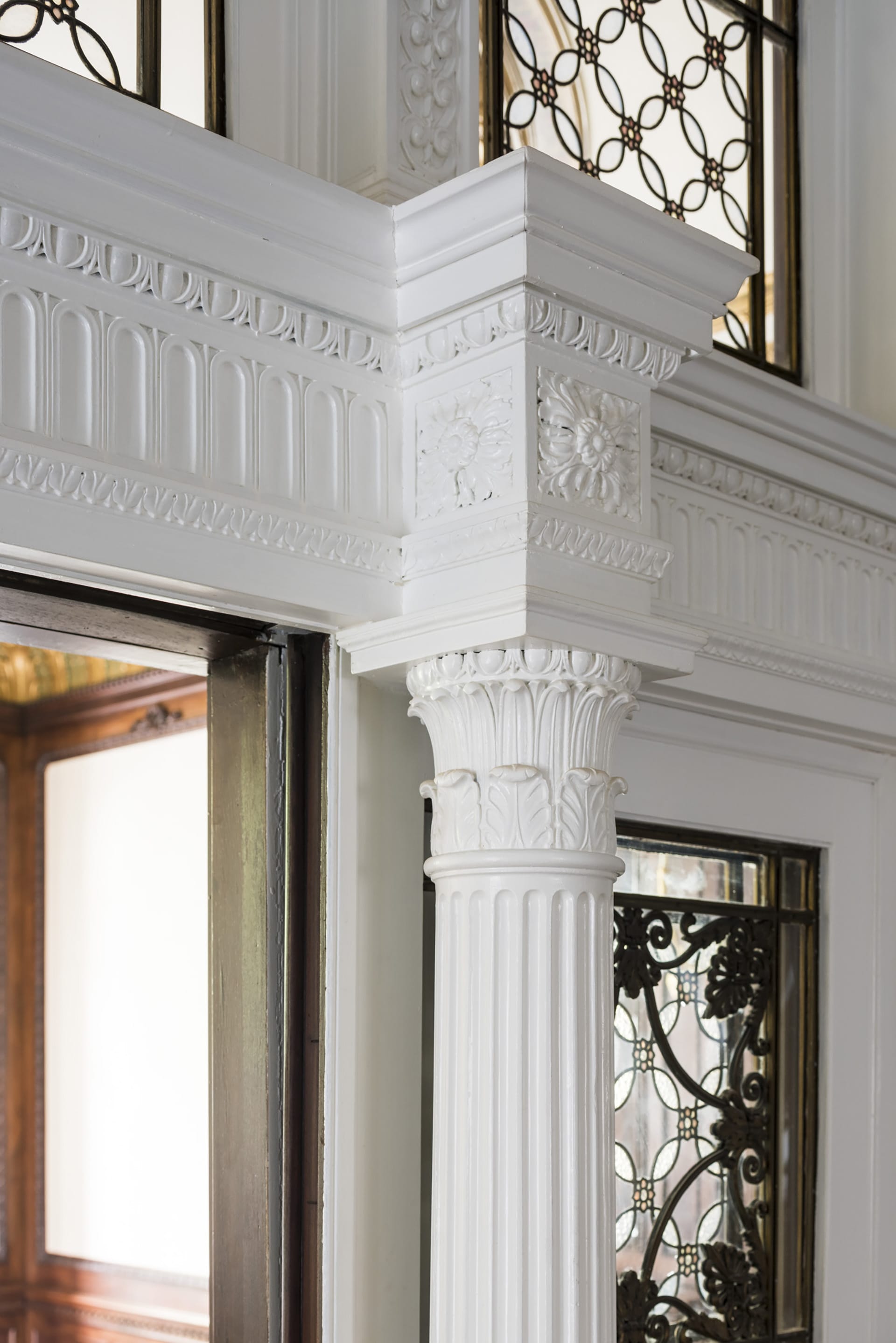 Detailed image of restored historic windows and molding in an Upper West Side mansion